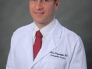 Dr. Adam L Kouyoumjian, MD